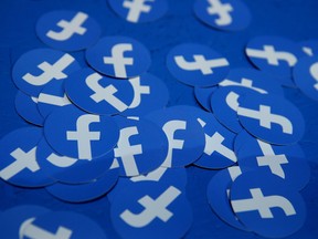 Facebook logos are displayed during the F8 Facebook Developers conference in San Jose, California. Facebook unveiled Tuesday its global crypto-currency "Libra."