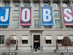A jobs sign on the front of the U.S. Chamber of Commerce building in Washington, DC. Jobs data out today in the U.S. missed expectations while Canada beat.