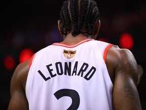 Kawhi Leonard #2 of the Toronto Raptors looks on against the Golden State Warriors in the second half during Game Five of the 2019 NBA Finals at Scotiabank Arena on June 10, 2019 in Toronto.