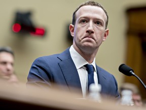 Mark Zuckerberg, chief executive officer and founder of Facebook Inc., listens during a House Energy and Commerce Committee hearing in Washington, D.C., U.S., on Wednesday, April 11, 2018.