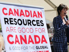 Alberta Energy Minister Sonya Savage spoke to several thousand pro pipeline protesters rallying at Stampede Park during the Global Petroleum Show in Calgary on Tuesday.