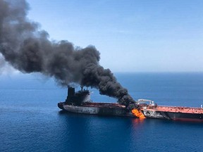 A picture obtained by AFP from Iranian News Agency ISNA on Thursday, reportedly shows fire and smoke billowing from a tanker said to have been attacked in the waters of the Gulf of Oman. Suspected attacks left two tankers in flames in the waters of the Gulf of Oman today, sending world oil prices soaring.