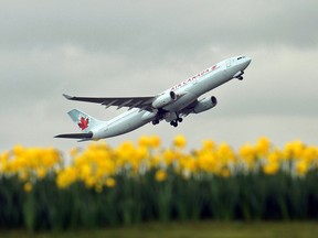 n this file photo taken on March 25, 2010, an Air Canada plane takes off from London Heathrow Airport.