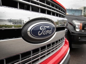 An F-150 pickup truck at a car dealership. In terms of brands, Ford led the pack with 154,203 vehicles sold in Canada this year to date.