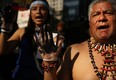 Protesters demonstrate in front of a United States courthouse against Chevron on Oct. 15, 2013 in New York City.