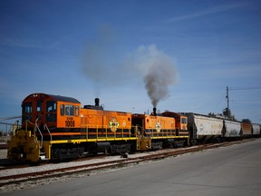 Genesee & Wyoming Inc. switching locomotives pull a grain train at the Port of Galveston in Galveston, Texas, U.S.