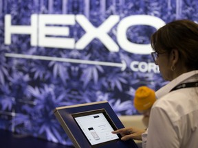 An attendee uses a touchscreen at the Hexo Corp. booth during the Montreal Cannabis Expo last year.