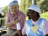 Former Chrysler Corp. chairman Lee Iacocca and rapper Snoop Dogg in a 2005 Chrysler ad.