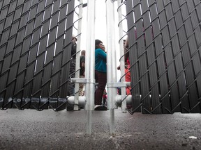 Refugees who crossed the Canada/U.S. border illegally wait in a temporary detention centre in Blackpool, Quebec, August 5, 2017.