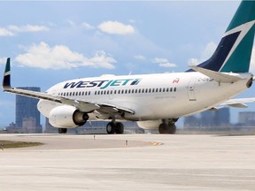 A Westjet Boeing 737 taxis towards the Calgary International Airport.