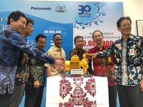 Representatives involved in the water pump production in Indonesia gathered in celebration of this milestone.