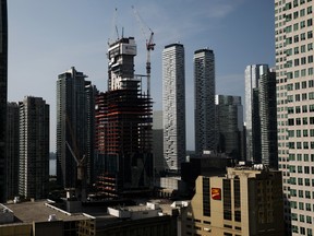 Canadian Imperial Bank of Commerce (CIBC) Square tower stands under construction in Toronto on Monday, July 29, 2019.