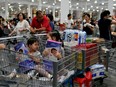 People visit a U.S. hypermarket chain Costco Wholesale Corp store in Shanghai, China August 28, 2019.