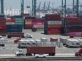 In this file photo taken on Aug. 01, 2019, shipping containers from China and Asia are unloaded at the Long Beach port, California.