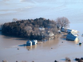 This image released by the Office of Nebraska Governor Pete Ricketts shows a flooded farm in Nebraska on March 15, 2019.