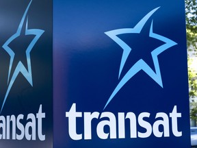 An Air Transat sign is seen in Montreal on May 31, 2016.