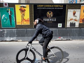 A sign advertising luxury condos under construction in Toronto.