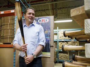 Andrew Scheer visits a baseball bat manufacturing facility, in Thorold, Ont., where he promised new measures for small business if elected.