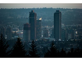 Experts say a pair of Liberal proposals to make home ownership more attainable would have a subdued impact, particularly in markets like Vancouver, Victoria and the Greater Toronto Area where property prices continue to soar beyond the reach of many residents. Condo towers under construction are seen in the Brentwood area of Burnaby, B.C., at dusk on Saturday, Aug. 3, 2019.