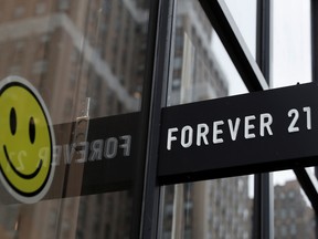 The sign for clothing retailer Forever 21 is seen outside a store in New York City.