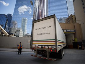 A delivery truck enters the Hudson's Bay Co. head office and flagship store in Toronto.