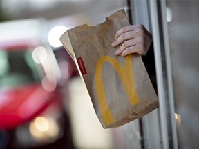 McDonald’s hopes machines and artificial intelligence will help it move cars through the drive-thru lane more quickly and take orders more accurately than employees.