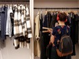 A woman looks at clothes at the Rent The Runway store, an online subscription service for women to rent designer dress and accessory items, in New York City.