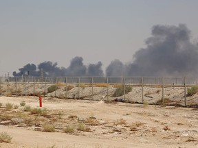 Smoke billows from an Aramco oil facility in Abqaiq in Saudi Arabia's eastern province on September 14, 2019.