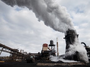 Steam rises from a coke quenching tower at the Stelco Holdings plant in Nanticoke, Ontario.