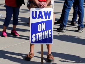 A "UAW On Strike" sign is seen during a rally outside the shuttered General Motors Lordstown Assembly plant during the United Auto Workers national strike in Lordstown, Ohio.