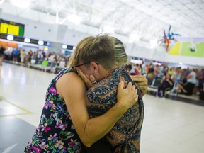 Thomas Cook passengers at Las Palmas Airport, Canary Islands, after the world's oldest travel firm collapsed on Monday, stranding hundreds of thousands of holidaymakers around the globe and sparking the largest peacetime repatriation effort in British history.