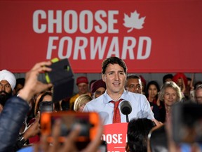 Prime Minister Justin Trudeau speaks with supporters during an election campaign rally in Surrey, British Columbia, September 24, 2019.