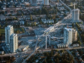 The Vancouver Skytrain line passes through condominiums under construction.