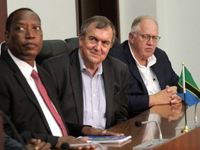 Palamagamba Kabudi, Tanzania's Foreign Minister, left, Mark Bristow, chief executive of Barrick Gold, and Willem Jacobs, Barrick Gold Corp Chief Operating Officer Africa and Middle East attend the launch of Twiga Minerals Heralds Partnership between Tanzania Government and Barrick Gold Corp in Dar es Salaam, Tanzania on Sunday.