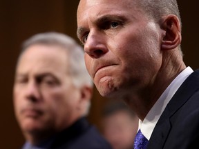 Dennis Muilenburg, right, president and CEO of the Boeing Company, and John Hamilton, left, vice president and chief engineer of Boeing Commercial Airplanes, testify before the Senate Commerce Committee October 29, 2019 in Washington, D.C.