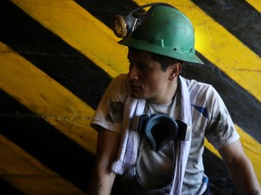 A miner is seen at the entrance of the La Paz mine of the Fura company, in Coscuez, Colombia September 11, 2019.