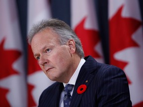 Stephen Poloz, governor of the Bank of Canada, listens during a press conference in Ottawa on Wednesday.