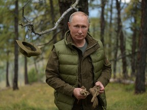 Russian President Vladimir Putin is seen during his holiday in the Siberian taiga, Russia October 7, 2019.