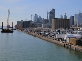 The downtown skyline and CN Tower are seen past the eastern waterfront area envisioned by Alphabet Inc's Sidewalk Labs as a new technical hub in the Port Lands district of Toronto.