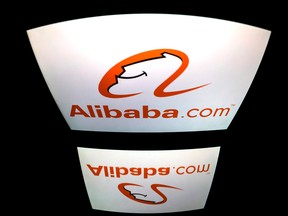 The logo of the Chinese multinational e-commerce, retail, internet, and technology conglomerate, Alibaba Group displayed on a tablet screen in Paris.