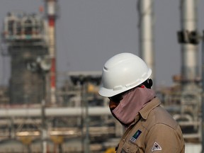 An employee at a Saudi Aramco oil facility in Abqaiq, Saudi Arabia.
