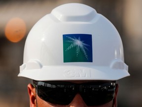 A Saudi Aramco employee at its oil facility in Abqaiq, Saudi Arabia.