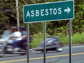 A sign points the way to Asbestos, Quebec.