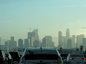 ommuters navigate early morning traffic as they drive towards downtown in Los Angeles, California.