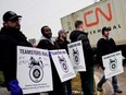 Teamsters Canada union workers picket at the Canadian National Railway at the CN Rail Brampton Intermodal Terminal after both parties failed to resolve contract issues, November 19, 2019.