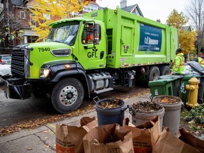 A truck from Canadian waste management company GFL Environmental Inc. in a Toronto neighbourhood. GFL scrapped its planned IPO this week.