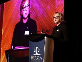 Kristine Delkus, retired General Counsel for TC Energy, receives her Lifetime Achievement award at the Western Canada General Counsel Awards (WCGCA) in Vancouver.