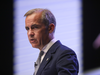 Bank of England Governor Mark Carney said the existing global payments system suffers from “deficiencies” and “malign neglect.”