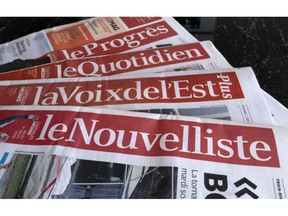 A selection of newspapers owned by Groupe Capitales Medias (GCM) are pictured in Montreal on August 19, 2019.