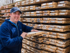 Geologist Rick Greenwood amongst core boxes in yard at the core shack.